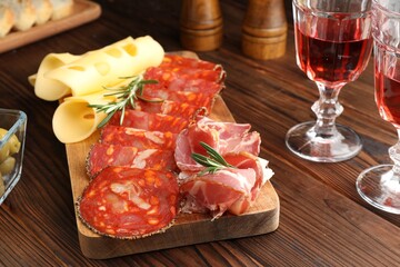 Delicious charcuterie board served on wooden table