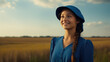 Beautiful young Amish women in traditional dress of community and hat headscarf in field. Portrait of pretty Amish lady.