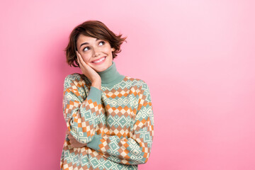 Sticker - Portrait of gorgeous creative lady hand touch cheek look empty space contemplate isolated on pink color background