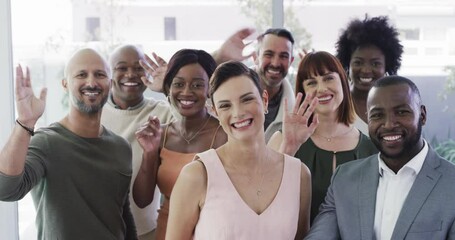 Wall Mural - Wave, hello and happy business people in office together for teamwork, collaboration and greeting. Diversity, celebration and portrait of men and women with hand gesture for welcome in workplace