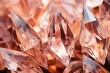 Abstract crystal background in peach fuzz colors with refracting of light and highlights on the facets