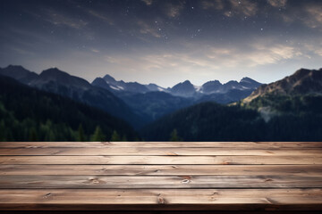 Empty wooden deck table against view of snowy mountain range in the night. With space for the product
