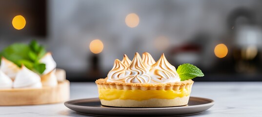 Delicious lemon meringue pie and assorted lemon desserts in a kitchen with blurred background