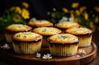 Delicious homemade lemon poppy seed muffins on defocused kitchen background with copy space