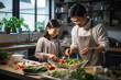 © Dzmitry - Father and daughter preparing vegetable salad in the kitchen.
