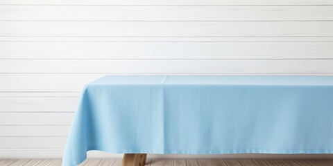 Wall Mural - Mock up design featuring a blue tablecloth on a white wooden table with copy space.