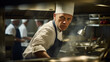 © Boris - Сhef in a restaurant kitchen preparing a dish close-up