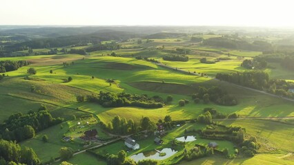 Wall Mural - Aerial landscape with green fields and hills	