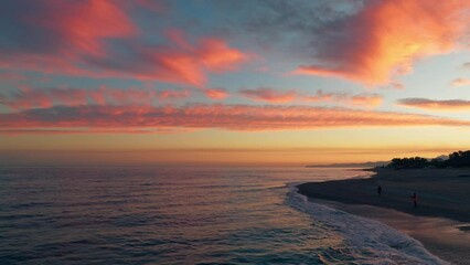 Wall Mural - Calm Waves Of Ocean Under Red Sunset