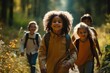 © visoot - A diverse group of four happy kids walking through the forest. Generative AI.