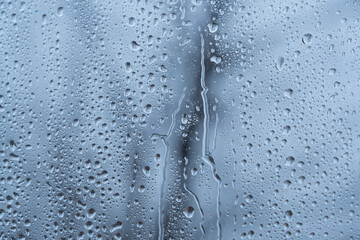 Wall Mural - Water drops. Rain on the clear glass window. 