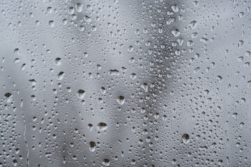 Wall Mural - Water drops. Rain on the clear glass window. 