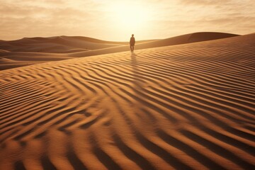 Wall Mural - A person standing alone in the vast expanse of a desert. This image can be used to depict solitude, exploration, or the harshness of the environment