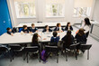 © Drobot Dean - Teacher giving anatomy lesson to group of school kids