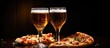 Glasses of beer and pizza shown in a close-up view.