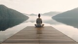 Fototapeta  - woman meditating while practicing yoga near lake in summer, sitting on wooden pierRear view of unrecognizable serene woman meditating while practicing yoga near lake in summer, sitting on wooden pier