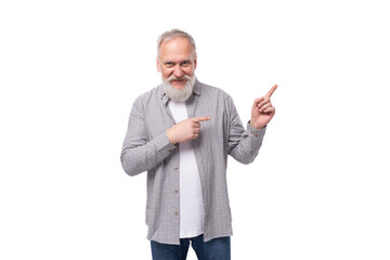 Wall Mural - handsome funny gray-haired elderly man with a beard and mustache in a plaid shirt on a white background with copy space