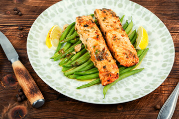 Wall Mural - Grilled or roasted salmon with beans.