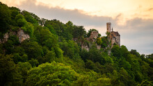 Panoramic View With Lichtenstein Castle Located In Swabian Jura Of Southern Germany On A Steep Cliff Overlooking The Echaz Valley Near Honau Reutlingen With Warm Sunset Atmosphere On A Summer Evening.