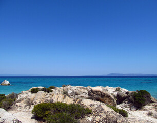 Panorama of white rocks, blue sky and blue sea. Summer concept.