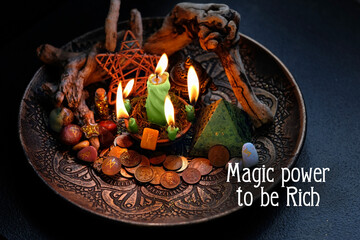 Magic power to be Rich. Witch altar with candles, old coins, stone runes, pentacle on dark table close up. Magic for attracting money, wealth. witchcraft. spiritual esoteric ritual