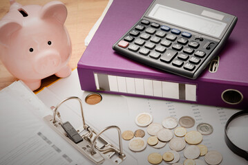 Finance concept with piggy bank and calculator