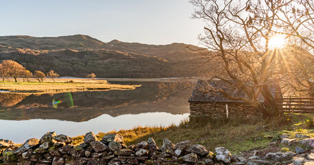 Wall Mural - Reflection views around Snowdonia lakes in winter