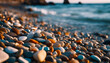 Multi-colored pebbles on the seashore. Smooth rocks at sunset Marine stones. AI generated