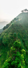 Canvas Print - Aerial view of the hill of Thani mai temple, close to Bandipur, Nepal. Details of the stepped path leading to the top of the hill
