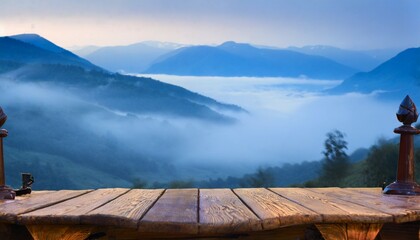 Wall Mural - in the misty morning landscape you can admire a wooden table against the backdrop of a blurred mountain view the cool sensation in blue hues adds to the overall ambiance