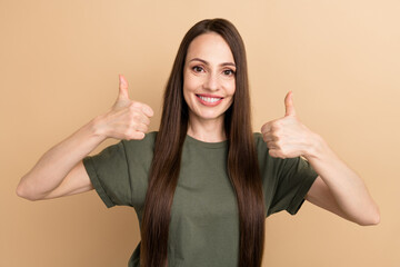 Poster - Portrait of charming model wear khaki t shirt thumbs up advertise efficient product fintech company brand isolated on beige color background