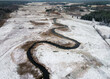 Natural river between the forest  winter- aerial high view