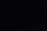 Fototapeta  - Starry night sky galaxy space background. Dark blue night sky with stars. New year, Christmas and all celebration backgrounds concept. 