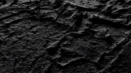 Wall Mural - Rough rocky dark surface. Dark crumpled texture surface. Used as a background and texture.