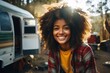 Smiling portrait of young woman at campsite