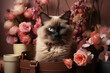 Cute Siamese cat with a bouquet of flowers and bag on a floral background.