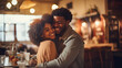 Portrait of a beautiful young black lovers hugging, smiling and loving each other. A couple of men and a woman in love celebrate Valentine's Day in a cozy cafe. The concept of romantic relationships.