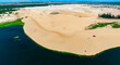 Stark geographical contrast between sand and water near Mui Ne, Vietnam. Mui Ne Desert of Vietnam is a desert in Southeast Asia