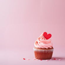Valentines Cupcake With Heart Sprinkles Isolated On Plain Pink Studio Background Template With Copy Space