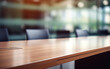 Close up of clean empty wooden table office and blurred bokeh office interior space background