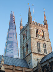 Wall Mural - London - The top of Shard tower and tower of Southwark cathedral in evening light.