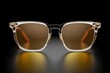 A pair of sunglasses on a black background. Suitable for fashion or accessory-related designs