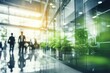 © FoxTok - Blurred background business people walking in the hall of modern glass office, business center, shopping center, bank. Business concept, modern interior with living green plants. Eco style