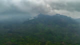 Fototapeta Natura - Aerial view of tropical landscape with mountains and jungle in Sumatra, Indonesia.