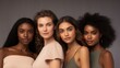 © goami - young multiracial women studio shot, caucasian and afro female multiethnic diversity concept, fashion models with perfect skin looking at camera