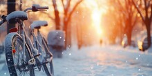 A Row Of Bicycles Parked In The Snow. Perfect For Winter-themed Designs And Outdoor Activities.