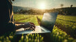 © Studio Nova - Person working on a laptop in an agricultural field at sunset, with a visual representation of data connectivity or innovation in farming technology overlayed on the image.