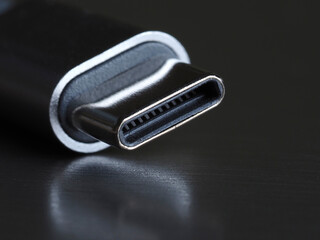 usb type c plug close-up on metal background