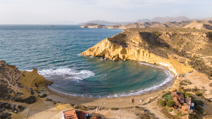 Aerial drone shot of the beautiful coastline and bays in Aguilas, Spain.