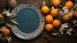 Background for Lunar New Year or Chinese New Year with flowering branch and tangerines. Copy space.